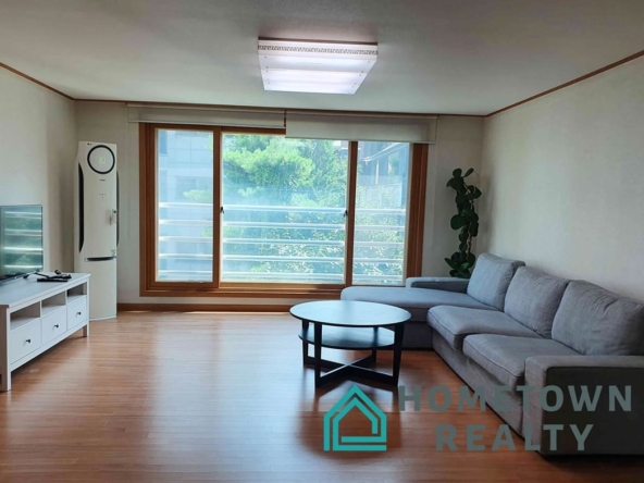 Living room with green outside